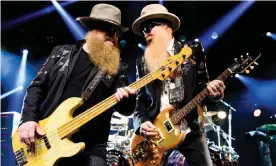  ??  ?? Dusty Hill (left) and Billy Gibbons performing as ZZ Top in 2016. Photograph: Manuel Lopez/EPA