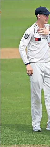  ??  ?? Yorkshire pride: Joe Root celebrates after dismissing Surrey’s Dean Elgar