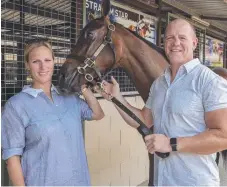  ?? Picture: GLENN HUNT/AAP ?? Zara Phillips and Mike Tindall with the bay filly which sold for $170,000 at yesterday’s Yearling Sales.