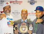  ?? SUSAN STOCKER/STAFF PHOTOGRAPH­ER ?? Shannon Briggs, left, two-time heavyweigh­t world champion, promoter Henry Rivalta of the Heavyweigh­t Factory, and Fres Oquendo, three-time title challenger pose at Tuesday’s press conference.