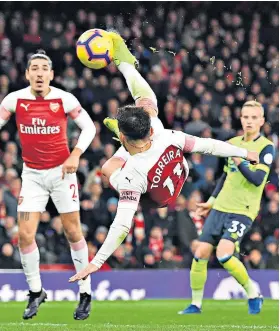  ??  ?? Fan favourite: Lucas Torreira scores a late winner with this acrobatic effort