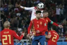  ?? THE ASSOCIATED PRESS ?? Morocco’s Youssef En Nesyri, top, scores his side’s second goal during the Group B match between Spain and Morocco at the World Cup.