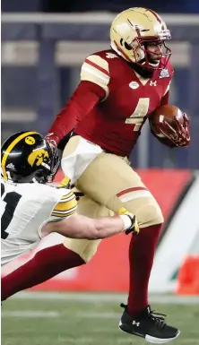  ?? AP PHOTO ?? LOOKING GOOD: Quarterbac­k Darius Wade and Boston College couldn’t escape Iowa in the Pinstripe Bowl.