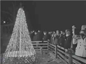  ?? PHOTOS BY BARBARA J. PERENIC/COLUMBUS DISPATCH ?? The Legendary Lights of Clifton Mill will be on display through Dec. 30.