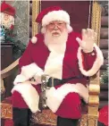  ?? THE CANADIAN PRESS ?? George McKay, who’s been playing Santa Claus for 45 years, says he’s never seen anything like this in his life.