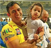  ??  ?? M. S. Dhoni with daughter Ziva.