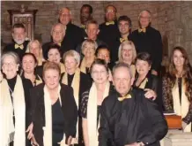  ??  ?? Elsabe Barkhuzen and her musical partner, orchestra director Norman Carless (front right) with members of the choir.