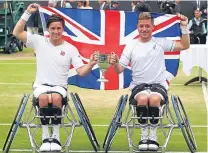  ??  ?? ■ Gordon Reid and Alfie Hewitt celebrate their Doubles success yesterday.