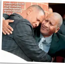  ??  ?? Clarence Franklin (R) hugs an attendee after his mother’s funeral in Detroit on Aug. 31.