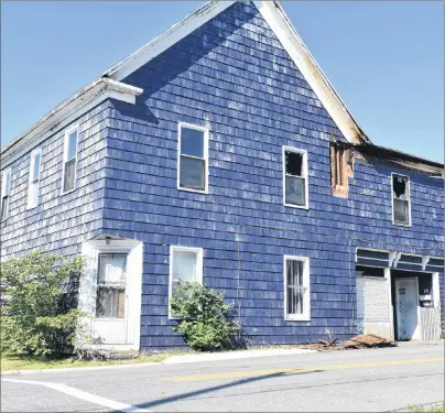  ?? JEREMY FRASER/CAPE BRETON POST ?? Five people and an animal were evacuated after a structure fire at 18 Peppett St., in North Sydney. The fire happened early Tuesday morning. There were no injuries.