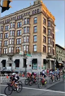  ?? SUBMITTED PHOTO ?? Racers in the Benchmark Criterion Twilight Classic whiz along the streets of West Chester on Saturday.