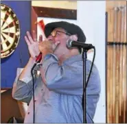  ?? PHOTO BY DOM FORCELLA ?? Kosher Kid performs at the Northeast Blues Harmonica Showcase at Black-Eyed Sally’s in Hartford.