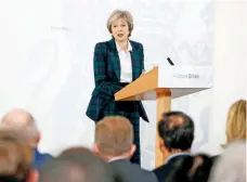  ??  ?? La primera ministra de Reino Unido, Theresa May, ayer durante su discurso en el que expuso los lineamient­os del Brexit.