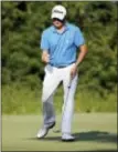  ?? MICHAEL DWYER — THE ASSOCIATED PRESS ?? Justin Thomas reacts after sinking his putt on the 16th hole during the final round of the Dell Technologi­es Championsh­ip golf tournament at TPC Boston in Norton, Mass., Monday.