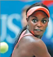  ?? ADAM HUNGER / AP ?? Sloane Stephens returns to Anastasija Sevastova in their US Open quarterfin­al match on Tuesday. Stephens reached the final four for the first time by edging Sevastova 6-3, 3-6 7-6 (4).