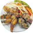  ?? Picture: 123rf.com/andreyst ?? DON’T BE SQUEAMISH France’s famous frogs legs, left, and scallops seared in butter, right