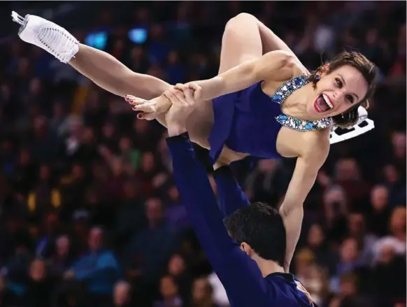  ?? MADDIE MEYER PHOTOS/GETTY IMAGES ?? Canadian Meagan Duhamel could barely contain herself as the pairs’ gold-medal free skate came to an end. “I can’t keep anything in!’’ she said.