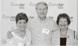  ??  ?? From left are Inge Liesner, Doug Meyers and Eve France. They were recognized by LeadingAge Texas for their artistic accomplish­ments.
