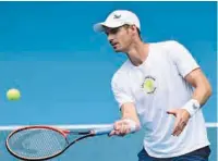  ?? (AFP) ?? Britain’s Andy Murray hits a return during a practice session at the Melbourne Park ahead of the Australian Open on Sunday.