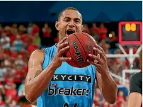  ??  ?? Breakers skipper Mika Vukona celebrates an overtime victory at the Perth Wildcats.