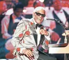  ?? KEVORK DJANSEZIAN/AP ?? Ray Charles, pictured performing in 1991, will be inducted into the Country
Music Hall of Fame.