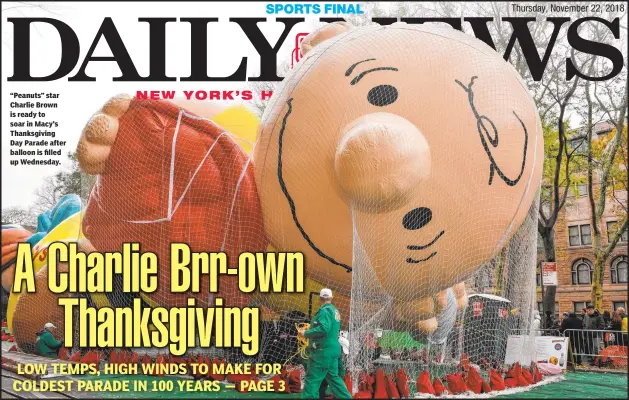  ??  ?? “Peanuts” star Charlie Brown is ready to soar in Macy’s Thanksgivi­ng Day Parade after balloon is filled up Wednesday.