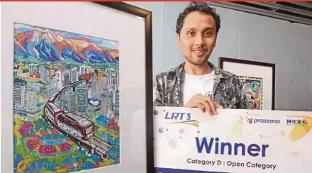  ?? PIC BY INTAN NUR ELLIANA ZAKARIA ?? 26-year-old Ahmad Syahmi Ismail, who won in the open category, is known for his paintings at a leading motor vehicle dealer company in Shah Alam and the ‘Drugs Valley’ mural in SK Sri Nilam in Kuala Lumpur.