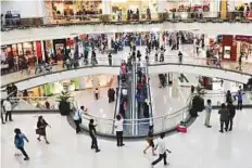  ?? Virendra Saklani/Gulf News Archives ?? Shoppers at Dubai Mall. The mall saw 21 million visitors, according to Emaar Malls.