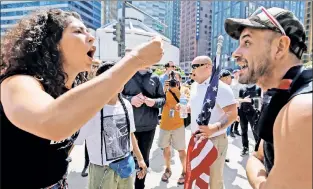  ??  ?? BIG DIVIDE: Protesters against “Sharia law” and supporting Muslim-Americans shout at each other during yesterday’s demonstrat­ions in Manhattan’s Foley Square.