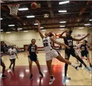  ?? TANIA BARRICKLO-DAILY FREEMAN ?? Alexia Diers (22) of Kingston put up a shot during Monday’s game against Newburgh Free Academy.