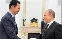  ?? PICTURE: SPUTNIK ?? Syrian President Bashar al-Assad meets his Russian counterpar­t, President Vladimir Putin.