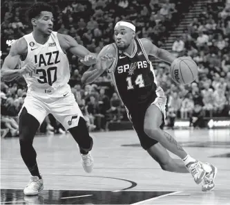  ?? Rick Bowmer/associated Press ?? Spurs guard Blake Wesley had maybe his best all-around game of his young career Tuesday against the Jazz, scoring nine points and getting six rebounds and a season-high three steals.