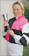  ?? Photo: TAYLER STRONG ?? In form: Rebecca Black holds the cup she won for being the most successful apprentice at the two day Riverton Easter meeting.