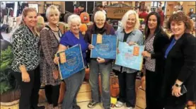  ?? PHOTO PROVIDED ?? Saratoga County seniors and Office for the Aging staff hold Hannaford Cause bags that can be purchased to support senior nutrition programs in the county. From left are Office for the Aging Deputy Director Judy Dahoda-Taylor, Office for the Aging...
