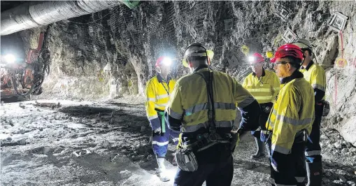  ?? PHOTO: SUPPLIED ?? Going undergroun­d . . . Facing (from left) Oceana Gold’s chief developmen­t officer Mark Cadzow and chief executive Mick Wilkes talk to staff in the Correnso undergroun­d mine at Waihi, in the central North Island, which produces about 7000oz of gold per month.