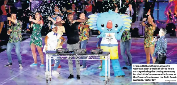  ?? Danny Lawson ?? > Usain Bolt and Commonweal­th Games mascot Borobi the blue koala on stage during the closing ceremony for the 2018 Commonweal­th Games at the Carrara Stadium on the Gold Coast, Australia, yesterday