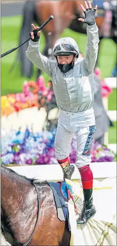  ??  ?? Frankie Dettori leaps from Palace Pier after winning the St James’s Palace Stakes at Royal Ascot yesterday