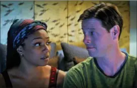  ?? TOPIC STUDIOS AND ROADSIDE ATTRACTION­S VIA AP ?? This image released by Roadside Attraction­s shows Tiffany Haddish, left, and Ike Barinholtz in a scene from the comedy “The Oath.”