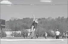  ?? Tim Godbee ?? A Calhoun pole vaulter gets to set to go over the bar during the field event at last week’s three-team triangular meet at the high school against North Murray and Ringgold.