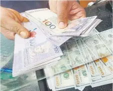  ?? ?? The Ministry of Finance (MOF) said the Malaysian central bank has also continued efforts to encourage the use of the local currency for export settlement to reduce dependence on the US dollar.