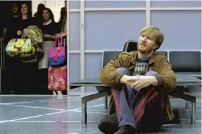  ??  ?? Jame Laing as the refugee in Scottish Opera’s producion of the airport-based comic opera Flight, main; composer Jonathan Dove, below