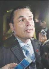  ?? CP Photo ?? Senator Patrick Brazeau speaks to reporters as he arrives at the Senate on Parliament Hill.