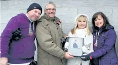  ?? KRIS DUBE/ SPECIAL TO THE TRIBUNE ?? The Hope Cup was held in Welland on Saturday, an event that raises money for the Hope Centre. Pictured from left are Paul Turner, Larry Larouche. Brenda Larouche and Tina Turner.