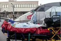  ?? PICTURE: SNCF ?? A coronaviru­s patient being transporte­d to a waiting TGV.