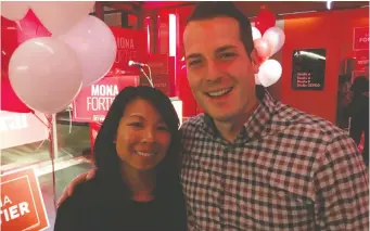  ?? HELMER
AEDAN ?? Coun. Mathieu Fleury and his wife Lai Hoang at Liberal incumbent Mona Fortier’s election night HQ.