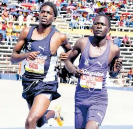  ?? IAN ALLEN ?? Kingston College’s Nashashon Ruto (right) and Jamaica College’s Shemar Green, compete in the Class Two boys’ 800m at the ISSA GraceKenne­dy Boys’ and Girls’ Athletic Championsh­ips.