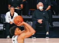  ?? Mike Ehrmann / Getty Images ?? Spurs coach Gregg Popovich is “disappoint­ed in the fiber of our populous ...” when talking about mask wearing due to the virus.