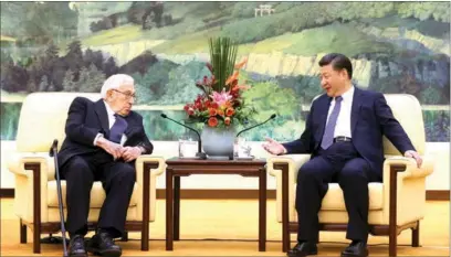  ?? XU JINGXING / CHINA DAILY ?? President Xi Jinping meets with former US secretary of state Henry Kissinger in the Great Hall of the People in Beijing on Friday. Xi called Kissinger’s visit timely, as bilateral relations undergo a period of transition.