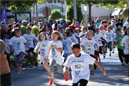  ?? COURTESY PHOTO ?? Area children participat­e in the 2017 Kendrick Fincher “Hydration for Life” Youth Run. This year’s event is set for May 12 at Pinnacle Hills Promenade in Rogers.