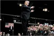  ?? CHIP SOMODEVILL­A/GETTY ?? Candidate Donald Trump takes the stage in October at a Phoenix rally. Many Arizona residents say they were worried but are glad Trump is keeping his campaign promises.